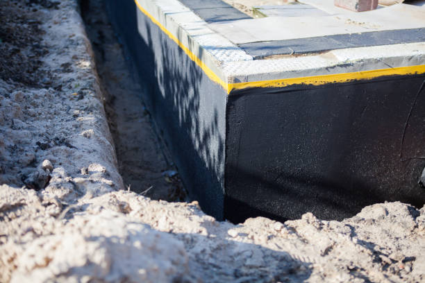 Professional Foundation Crack Repair technician working in Bloomington, IL